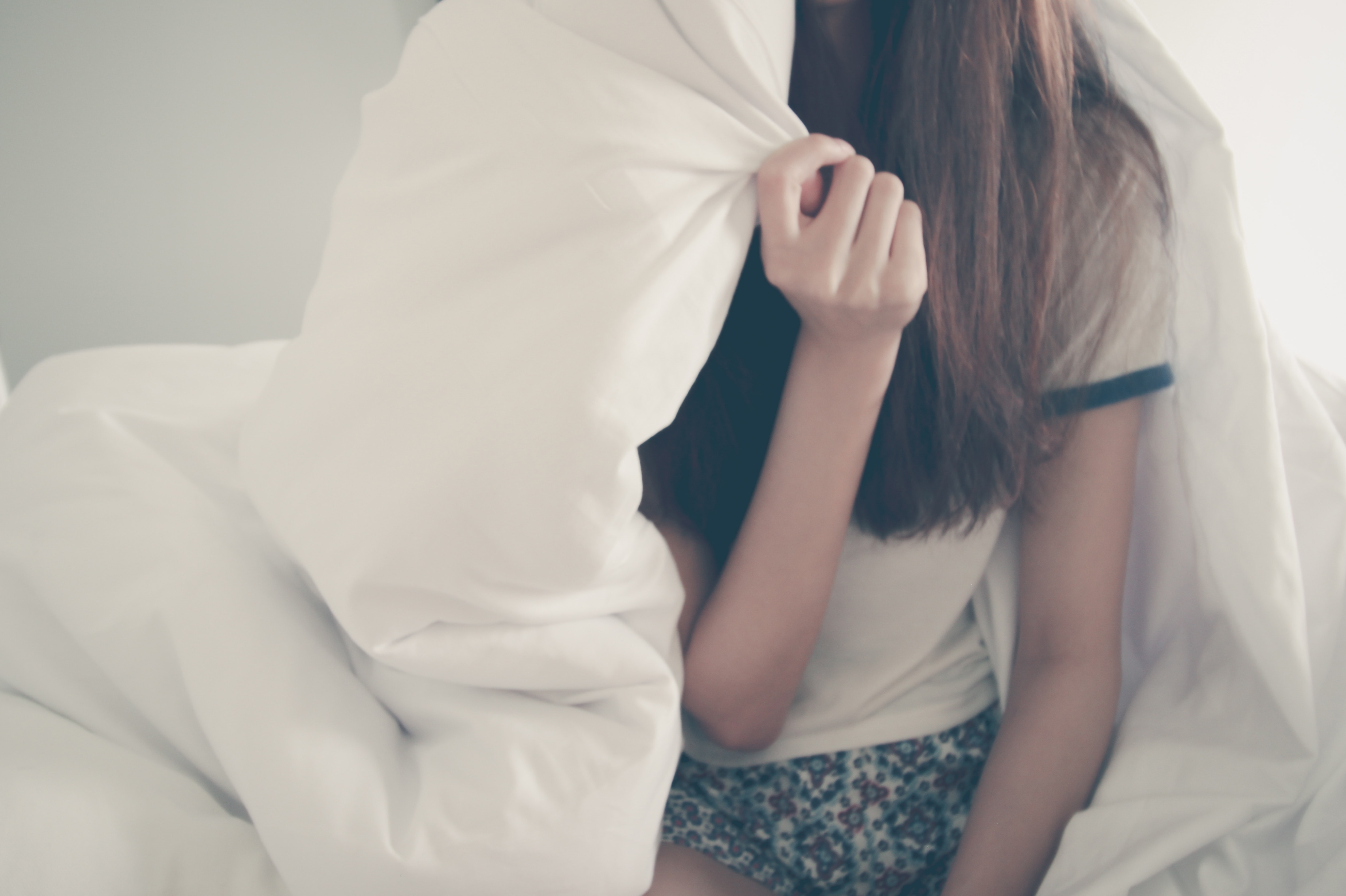 ベッドにいる女性